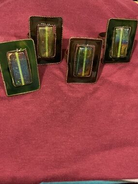 Pier one iridescent glass and copper napkin rings.